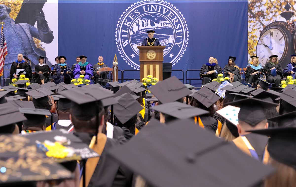 graduation ceremony with caps and gowns